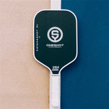 Katanashot XL Paddle by Oneshot Pickleball featuring a black carbon face and white logo, edge guard, and grip