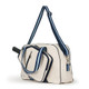 Angled side view of the Hamptons Pickleball Bag by Ame & Lulu with adjustable shoulder strap and interior organizer pockets.