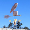 barn owl weathervane on a post