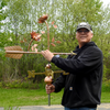 Todd holding Dahlia Flower Weather Vane for Size Reference