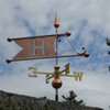 banner weathervane shown with letter H