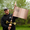 Todd Holding American Flag Weather Vane for Size Reference