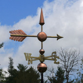 Center Arrow Weathervane right side view on cloudy background
