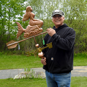 Todd Holding Mermaid Weather Vane for Size Reference