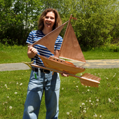Riley holding Sailboat weathervane for Size Reference