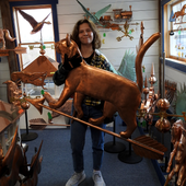 Riley holding Large Cat Weather Vane for Size Reference