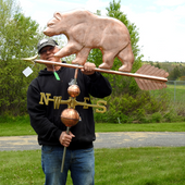 Todd holding Large Bear Weathervane for Size Reference