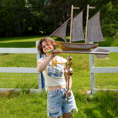 Riley holding Schooner Weather Vane for Size Reference