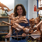 Riley holding Witch Weathervane for Size Reference