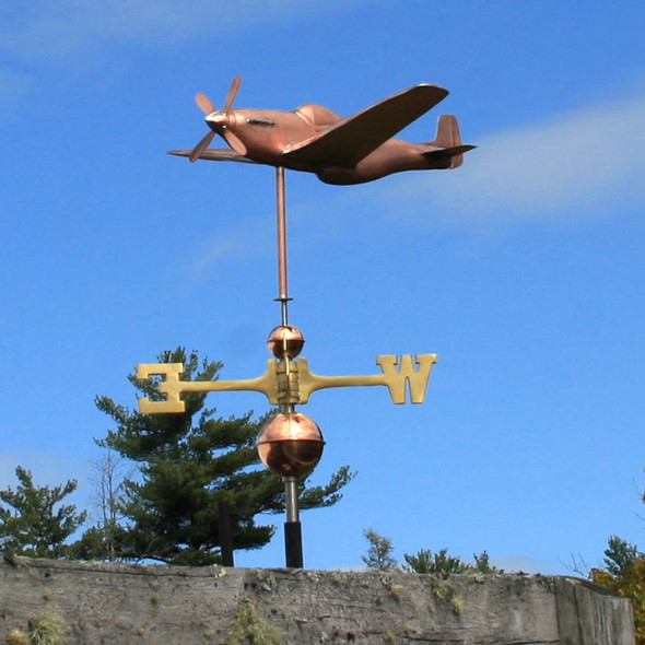 P51 Mustang Fighter Airplane Weathervane left side view on blue sky background