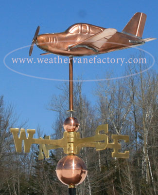 Low Wing Airplane Weathervane left side view on blue sky background