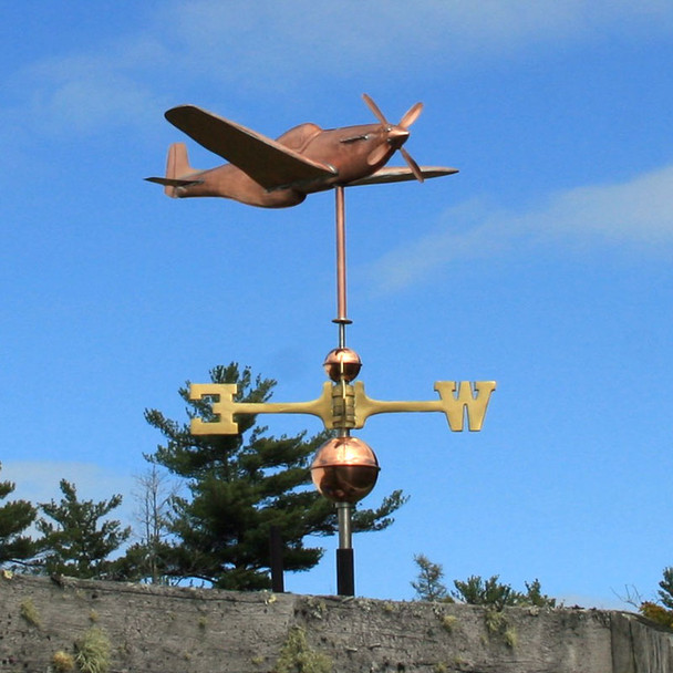 P51 Mustang Fighter Airplane Weathervane right  angle side view on blue sky background