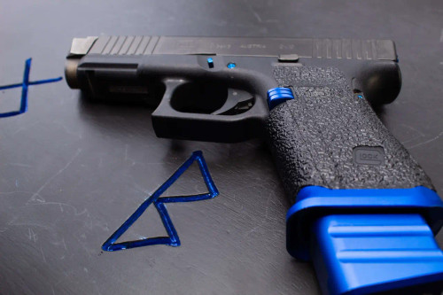 Cross Armory Glock 17 +5 magazine extension base pad (Black) — close-up of underside showing floorplate retention lip and screw points