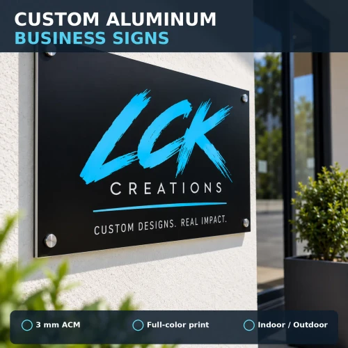 Custom aluminum composite business sign mounted outside a modern storefront featuring professional full-color company branding.