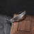 Norse compass cuff bracelet with dark recessed finish and raised silver-tone details