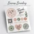 Close-up of custom glossy vinyl stickers showing vibrant full-color printing and a smooth reflective finish.