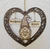 A laser cut wood ornament with filigree cutouts and optional name plates—perfect custom gift and seasonal decor.