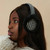 ISL-EARMUFFBLWDT Black and White Dogtooth Ladies Harris Tweed Fluffy Earmuffs Lifestyle ShamrockGift.com