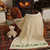 SAOL Irish Merino Wool Baby Blanket with Sheep and Shamrock Design Natural SA448 ShamrockGift.com