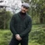 Saol Men's Aran Cable Shawl-Collar Cardigan MM200 Army Green Front view Lifestyle Shamrockgift.com