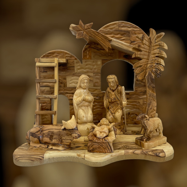 The Holy Family Nativity Set and Hand Carved Stable with Palm Tree
