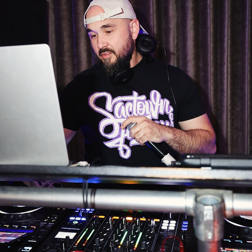 DJ Elements (pictured at Mix Downtown Nightclub) wearing Purple and black "City Color's" unisex T-shirt by Sactown Famous DJ Elements (pictured at Mix Downtown Nightclub) wearing Purple and black "City Color's" unisex T-shirt by Sactown Famous