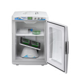 Benchmark Scientific H2200-H MyTemp Mini Benchtop Incubator with digital controls, shelf and internal power port for small lab rockers. Shown here with open door and optional small rocker operating inside