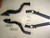Black ceramic coated XS-POWER long tube header and downpipe system for Audi B6 and B7 S4 4.2L V8 applications. Features 2000°F thermal barrier coating, 304 stainless steel tubing, 321 stainless steel flanges, catless off-road design, and performance-focused construction for maximum exhaust flow and reduced engine bay heat.