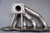 XS-POWER stainless steel turbo manifold for Mazdaspeed 3, Mazdaspeed 6, and Mazda CX-7 DISI Turbo applications. Features fully TIG welded construction, massive 11mm thick flanges, 3mm thick stainless steel runners, and high-flow design engineered to improve turbo spool, reduce exhaust backpressure, and support factory or upgraded turbochargers.