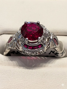 Genuine Sapphire and Natural Diamond Platinum Hidden Halo Ring