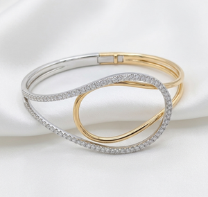 18K Two-Toned Oval shaped Diamonds Bangle