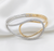 18K Two-Toned Oval shaped Diamonds Bangle