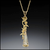 Fine jewelry necklace with a yellow beryl drop and gold botanical motif—perfect for formal wear or elevated everyday styling.