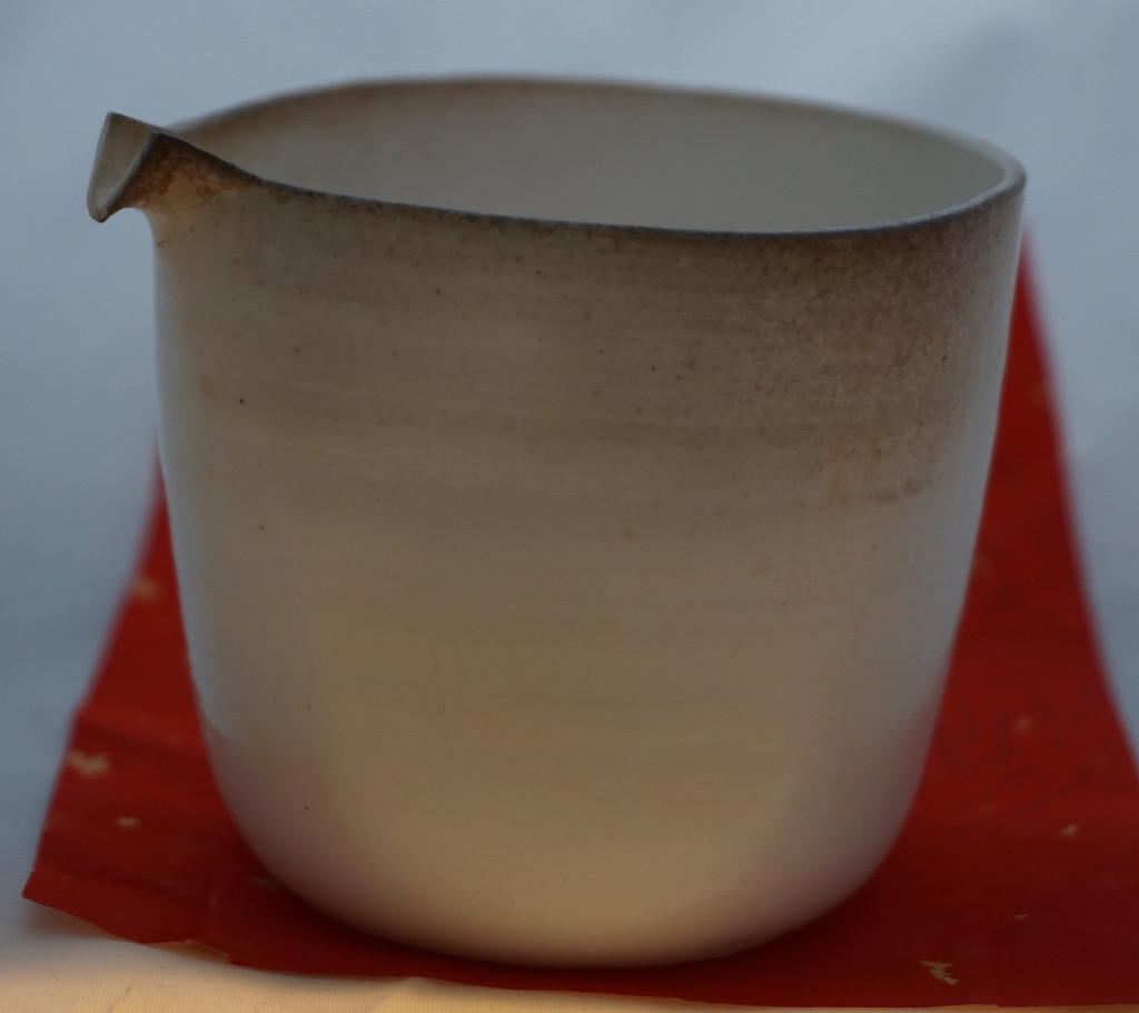 Porcelain tea sharing pitcher