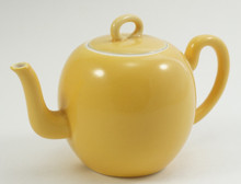 Cream yellow porcelain teapot