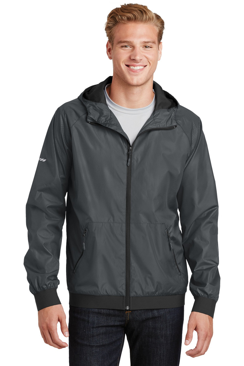 Sport-Tek® Embossed Hooded Wind Jacket. JST53 Graphite/ Black