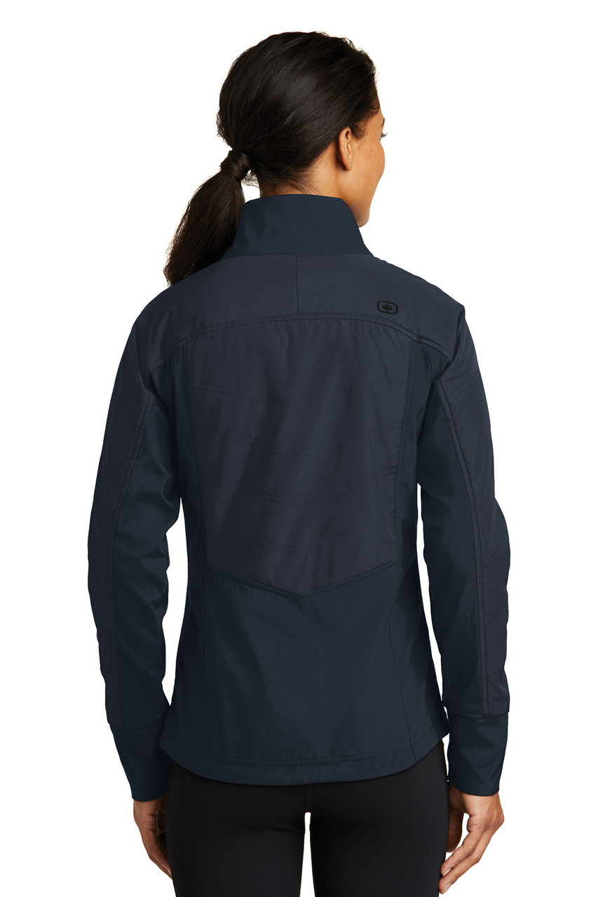 OGIO® ENDURANCE Ladies Brink Soft Shell. LOE722 Propel Navy Back