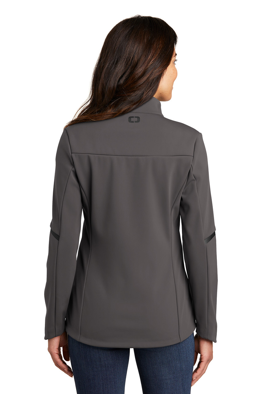 OGIO ® Ladies Exaction Soft Shell Jacket. LOG725 Tarmac Grey Back