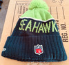Seattle Seahawks team logo on front NFL shield on back Seattle Seahawks NFL New Era Authentic Knit Hat with Pom