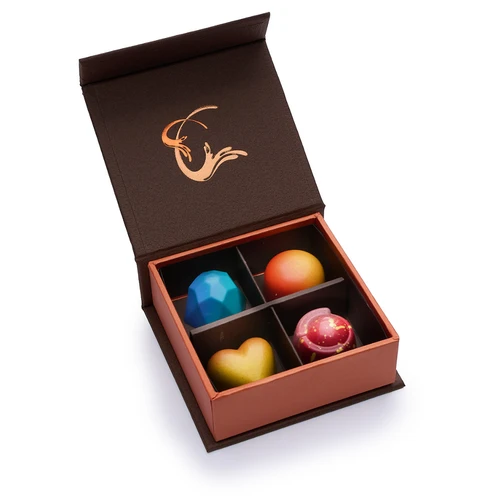 Infusion Chocolates 4-piece truffle gift box, open to show four truffles