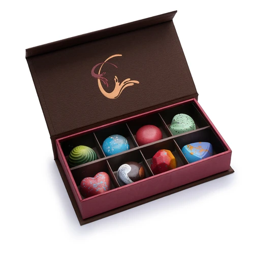 Infusion Chocolates 8-piece truffle gift box, open to show eight truffles