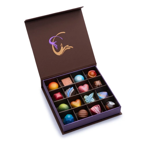 Infusion Chocolates 16-piece truffle gift box, open to show sixteen truffles