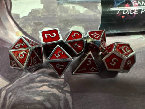 Assassin's Silver/Red Metal 7 Polyhedral Dice Set Assassin's Silver/Red Metal 7 Polyhedral Dice Set