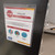 magnetic sign holder on cabinet