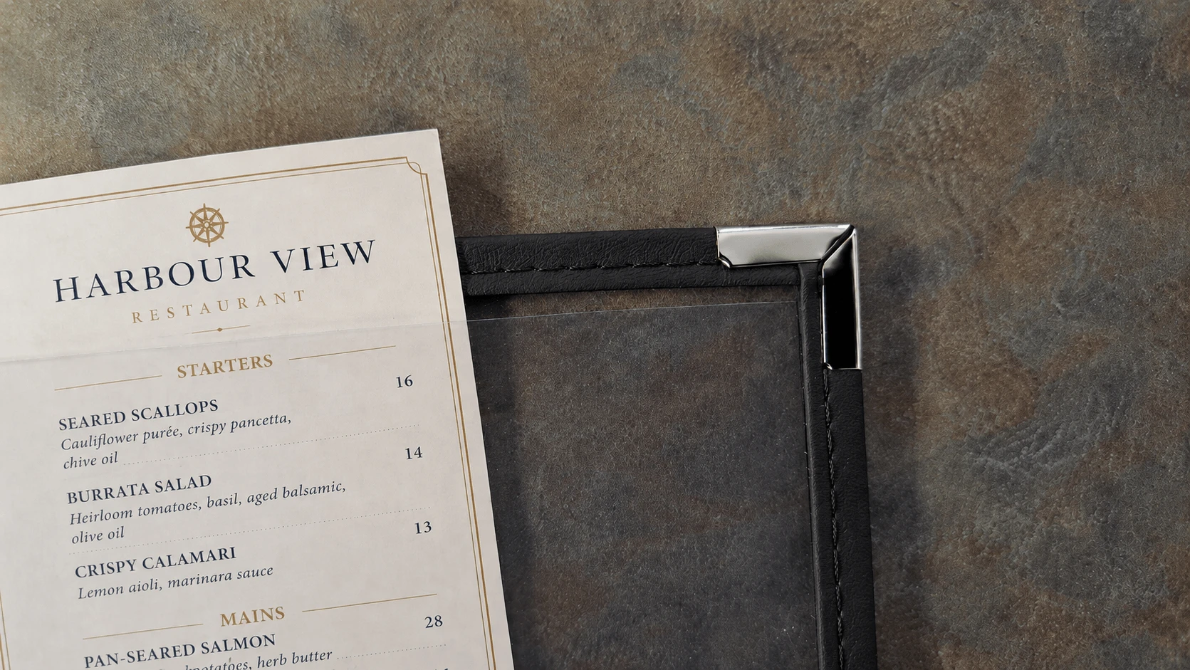 Close-up of RigidCore 16 clear menu cover showing the clear top pocket lip, stitched color border, and metal corner