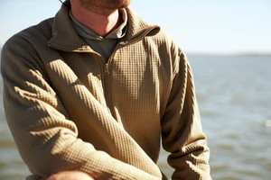 Elevate your layering game with this American-made grid fleece quarter zip, designed for superior warmth and breathability. Crafted from innovative grid-pattern fleece fabric, it traps heat efficiently while allowing airflow to keep you comfortable during outdoor activities or casual wear. The quarter zip design offers easy temperature control and a modern fit, making it perfect for hiking, running, or everyday layering. Proudly made in the USA, this versatile piece combines cutting-edge fabric technology with quality American craftsmanship.