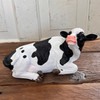 RESIN SITTING COW ASST