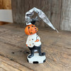 6in RESIN PUMPKIN MAN HOLDING BLACK SPIDER