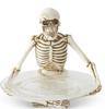 10in RESIN SITTING SKELTON HOLDING GLASS PLATE