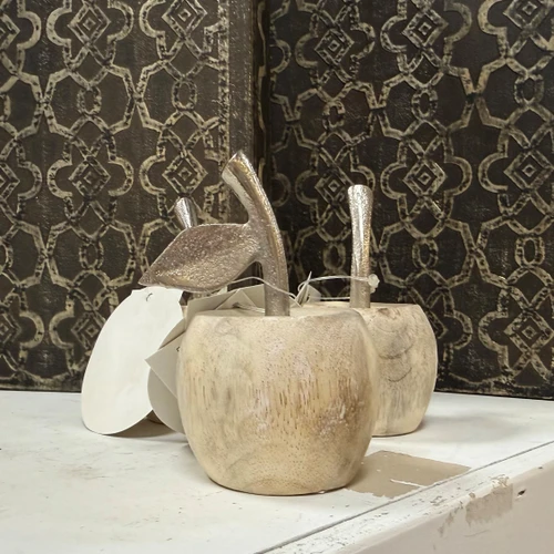 Decorative mango wood apple tabletop accent featuring a natural finish. Perfect for farmhouse styling, kitchen décor, or adding a warm, rustic touch to any space.